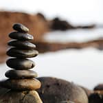 la meditacion balance blur boulder close up