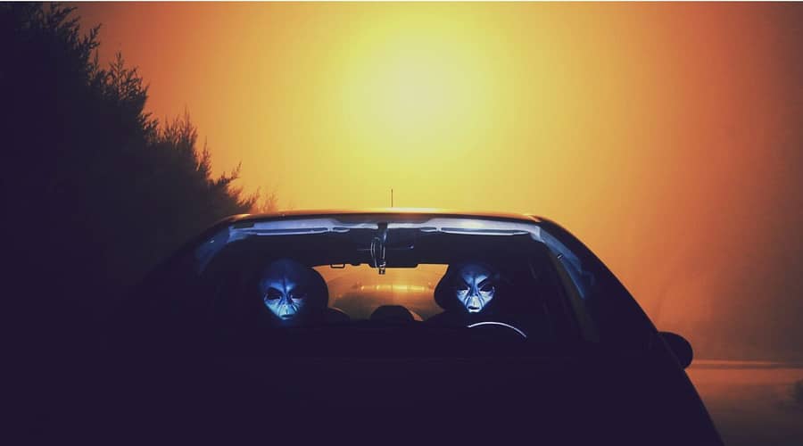 two alien inside car wallpaper